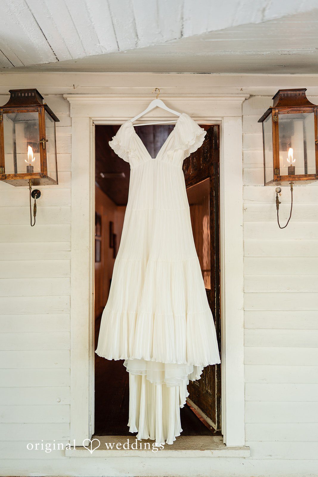 Elizabeth + Zodi Wedding dress hanging before the ceremony at The Wheeler House