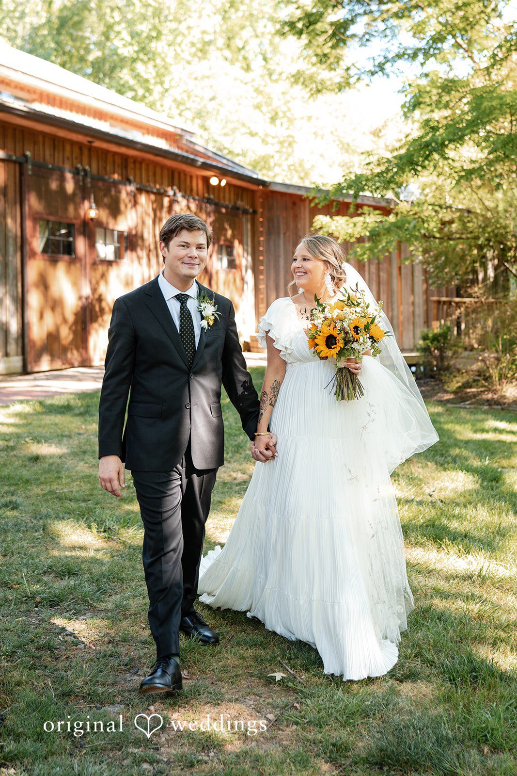 Elizabeth + Zodi Full-length portrait of the bride and groom in front of The Wheeler House