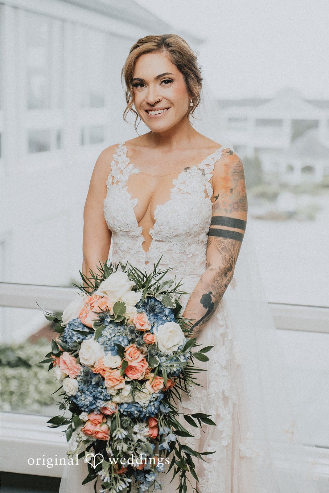 Taylor + David Bride holding her bouquet in a timeless wedding portrait
