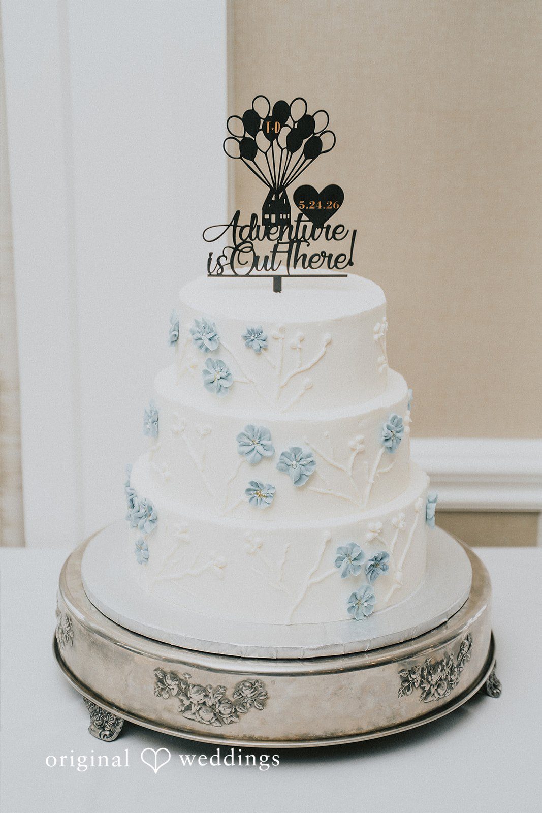 Taylor + David Simple and elegant wedding cake displayed at Watersedge Resort and Spa