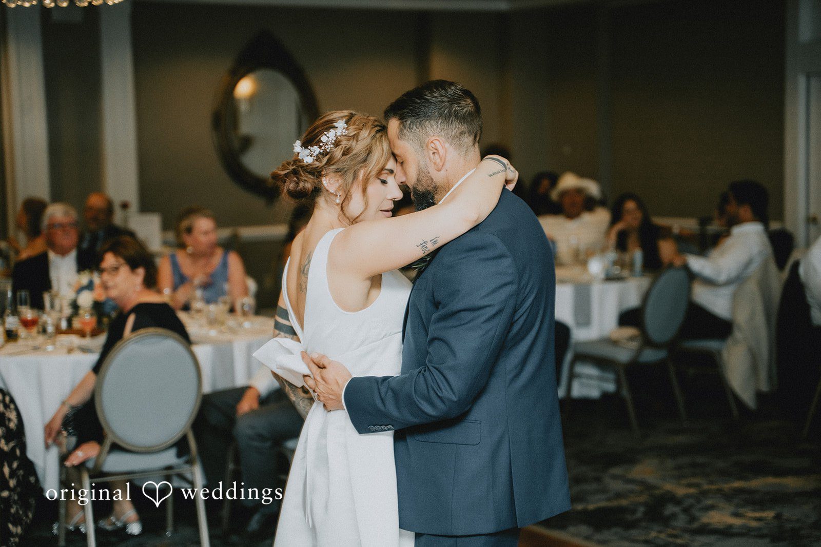 Taylor + David Bride and groom sharing their first dance at the wedding reception