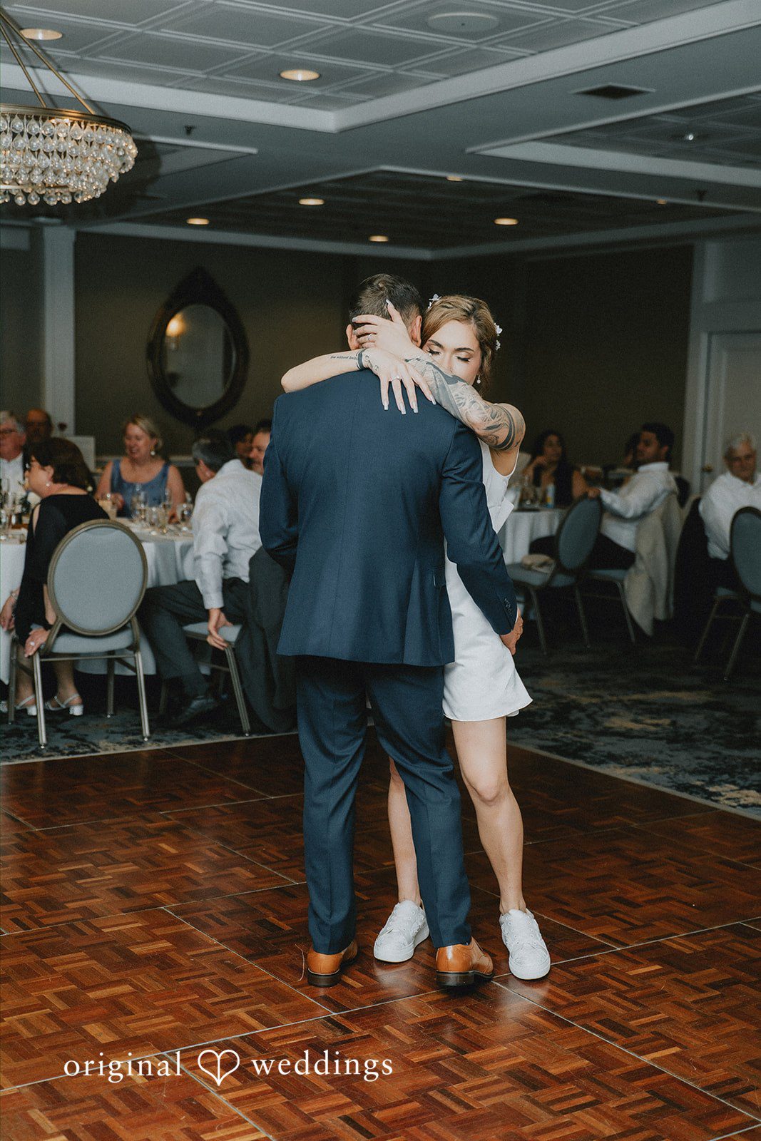 Taylor + David CT Wedding Photographers capturing joyful moments of the couple celebrating on the dance floor