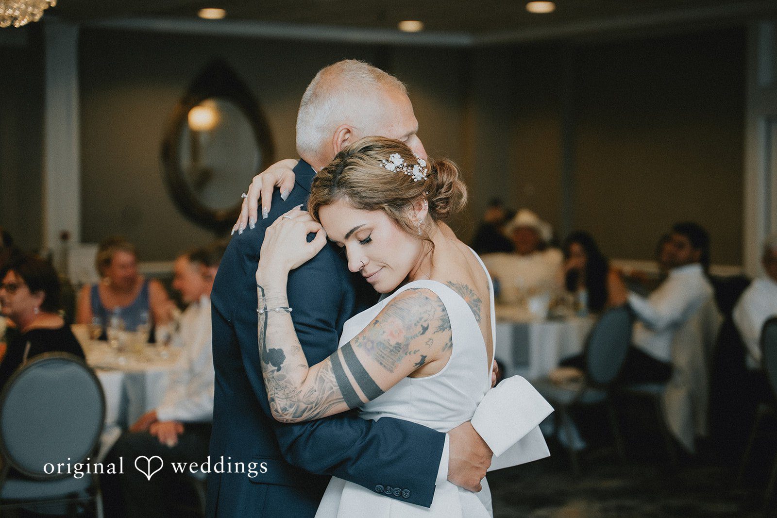 Taylor + David Bride dancing with her father during a heartfelt reception moment