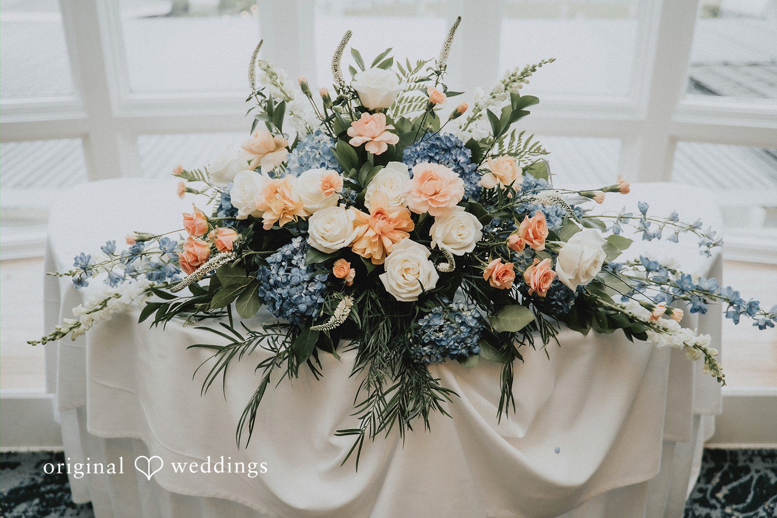 Taylor + David Close-up of beautifully styled reception table settings and wedding décor