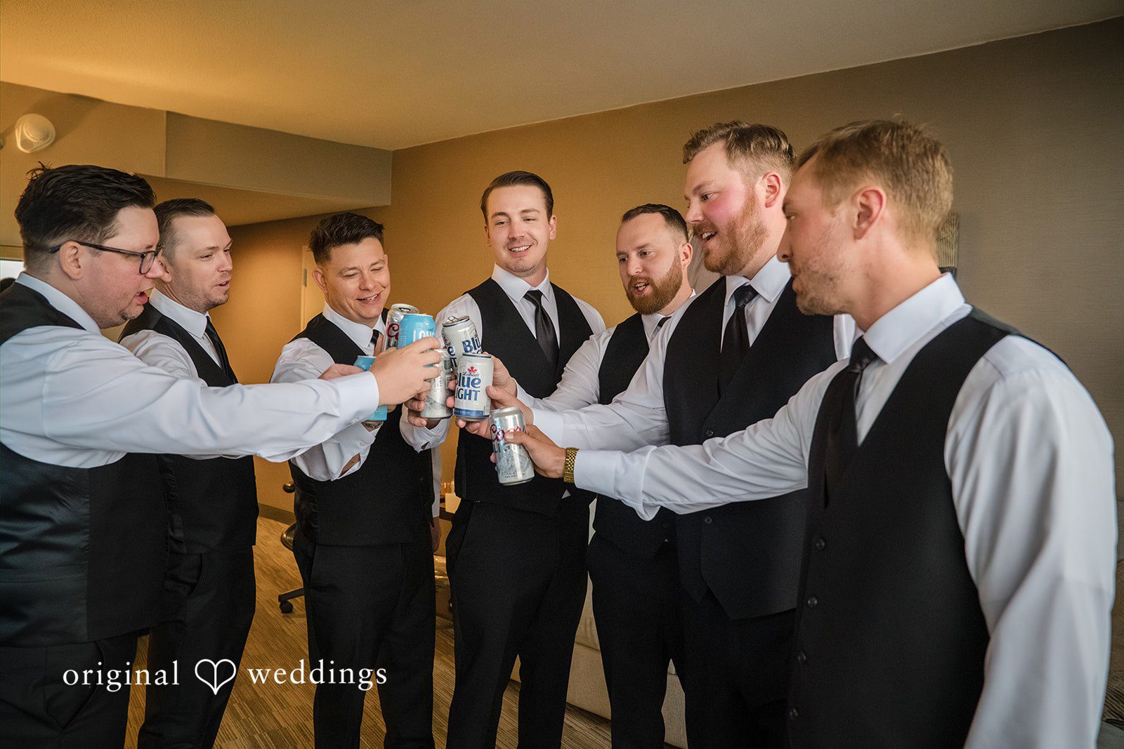 Ann + Justin Groom shares a toast with the groomsmen