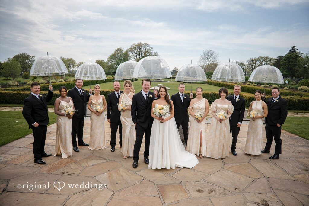 Ann + Justin Our Detroit wedding photographers at Original Weddings captured a stylish portrait of the couple and their bridal party at the Waterview Loft