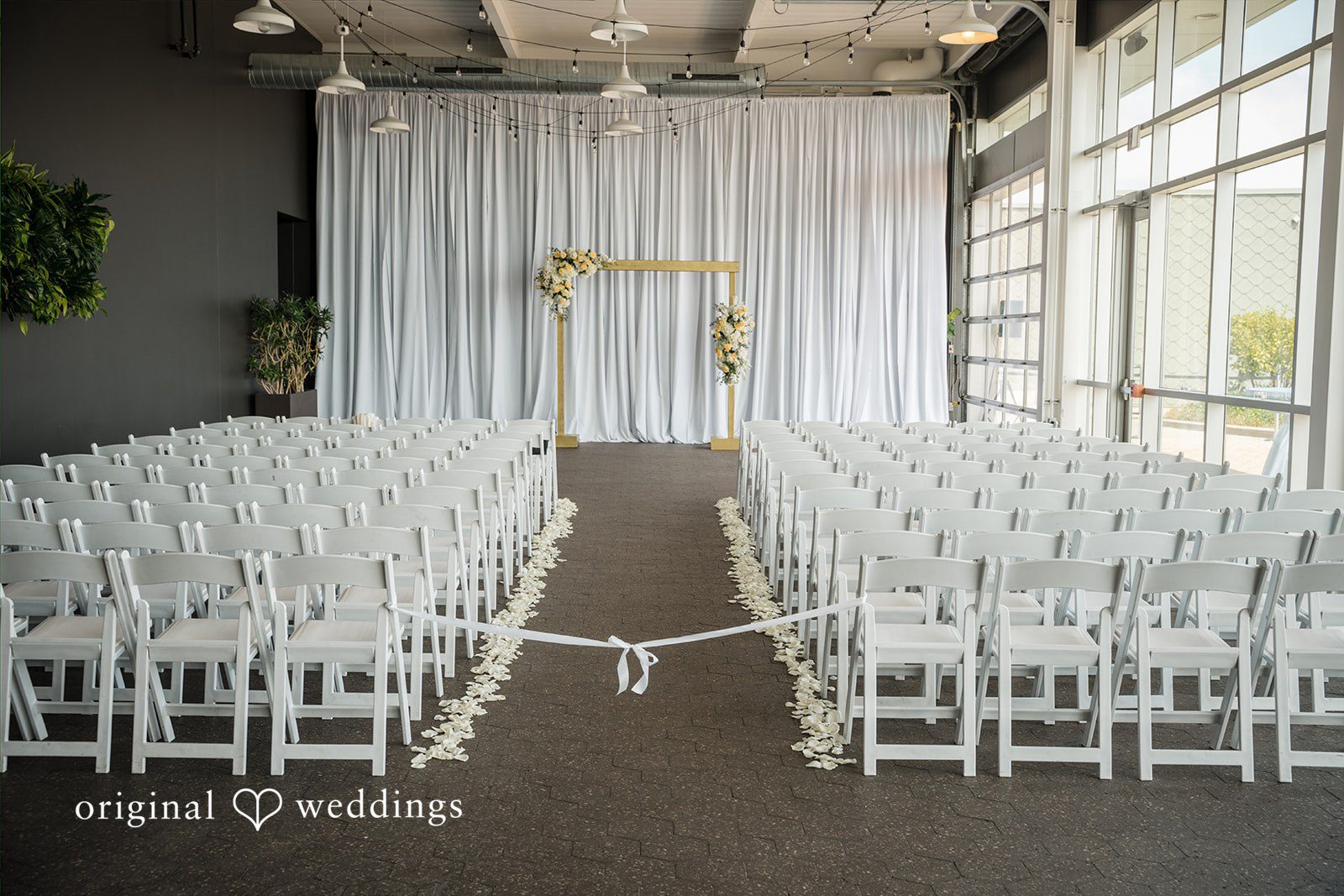 Ann + Justin The wedding ceremony space at Waterview Loft