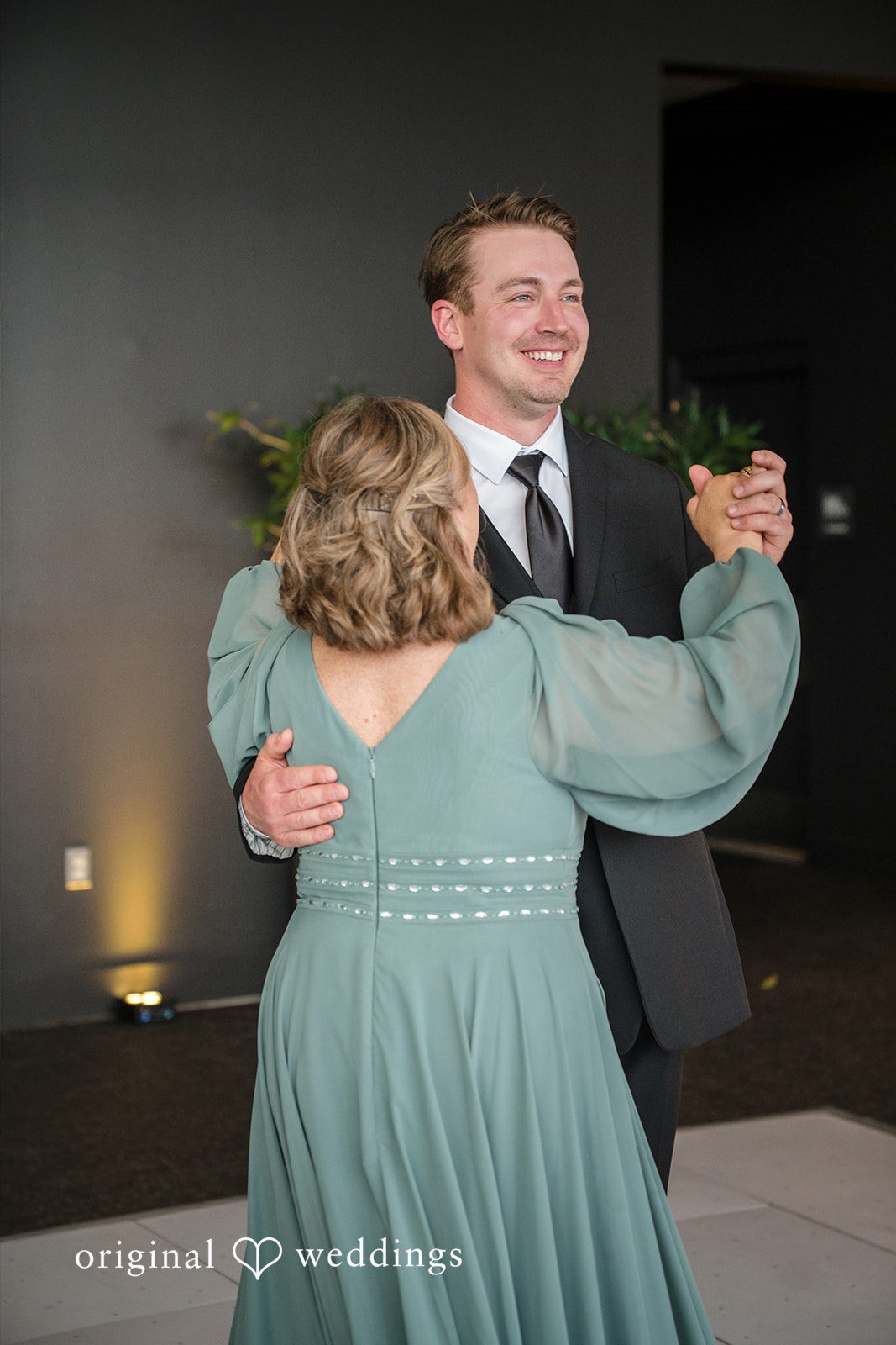 Ann + Justin The groom dances with his mother