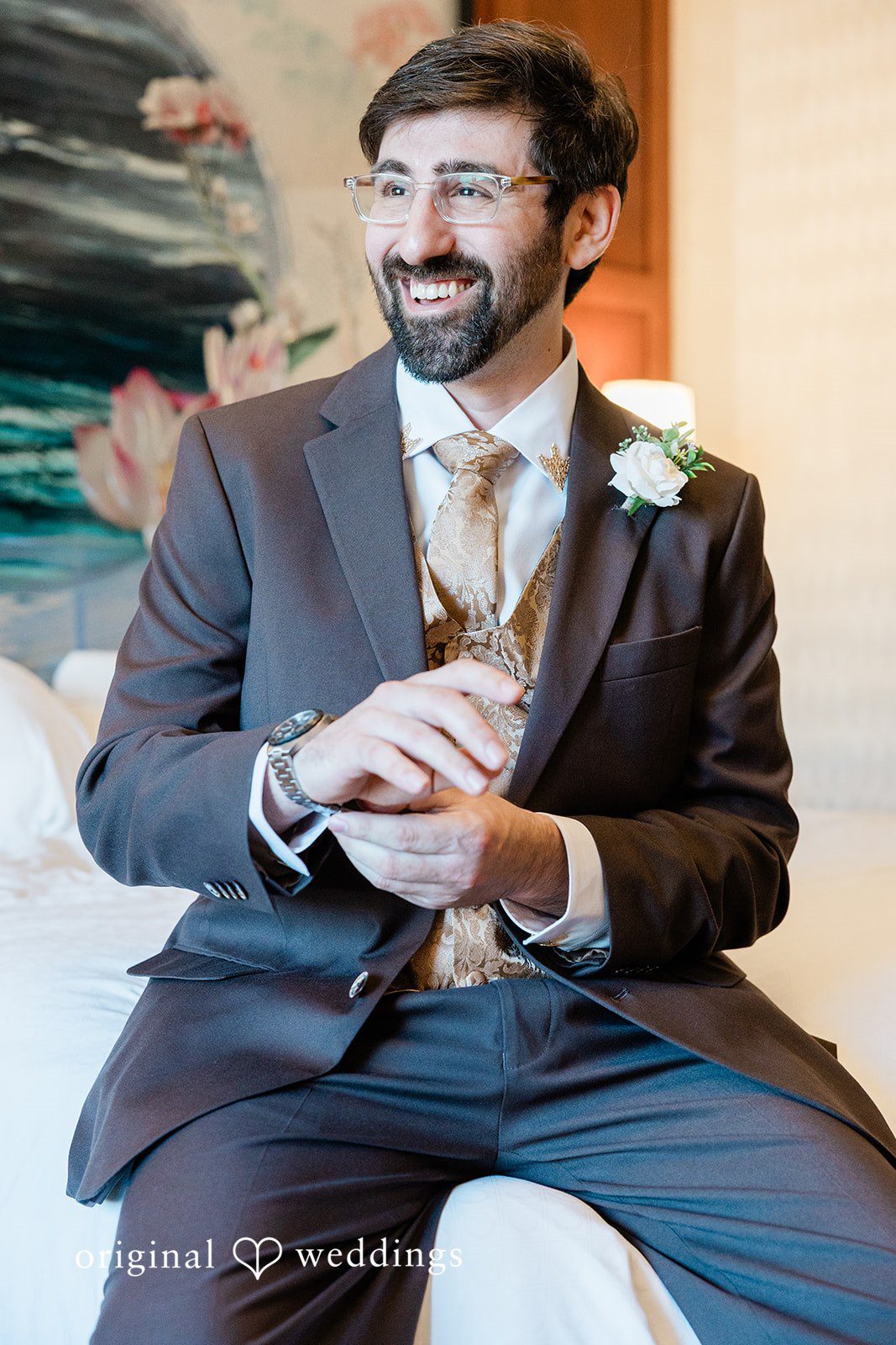 Sabrina + Jonathan Picture of groom smiling, and wearing his watch