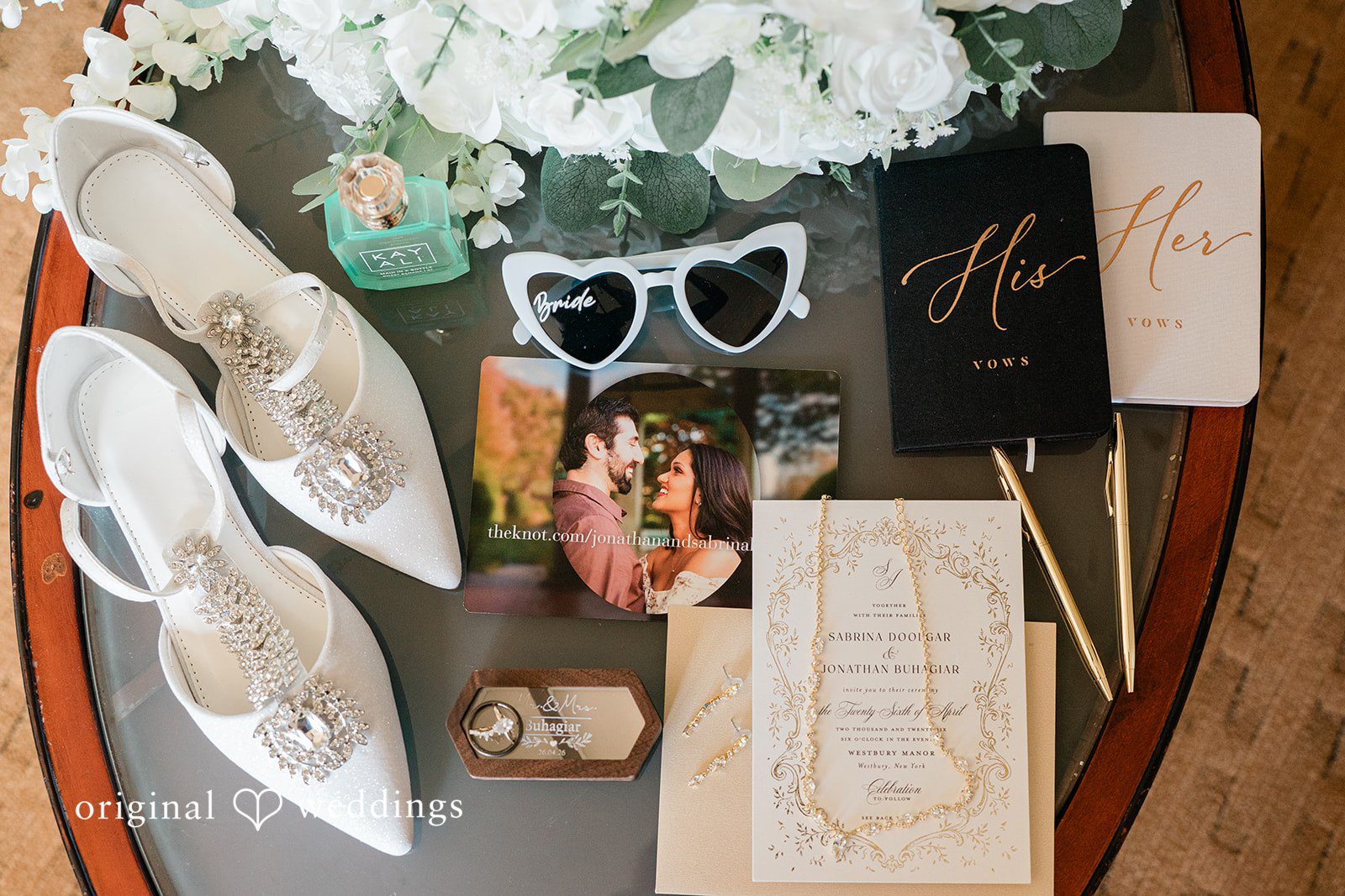 Sabrina + Jonathan Detailed shot of wedding accessories of bride at Westbury Manor