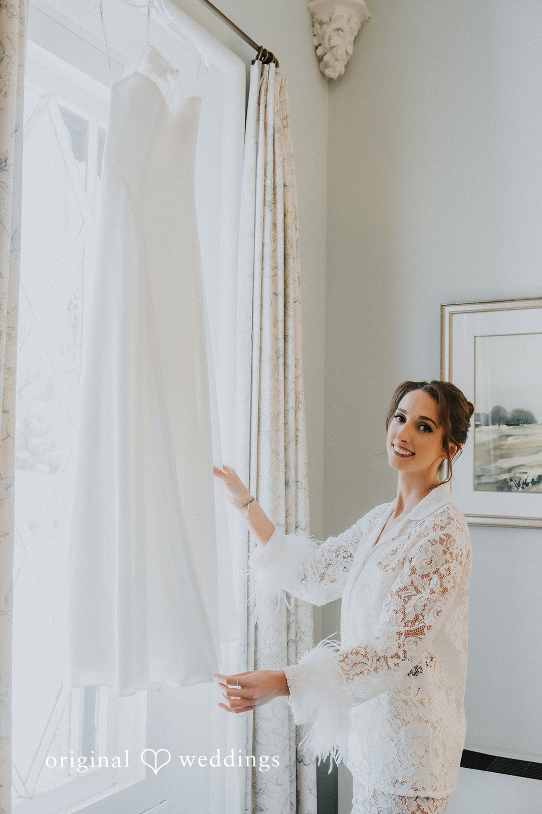 The bride by her wedding gown