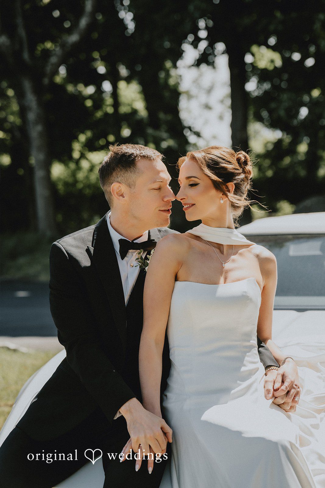 Romantic portrait by the car