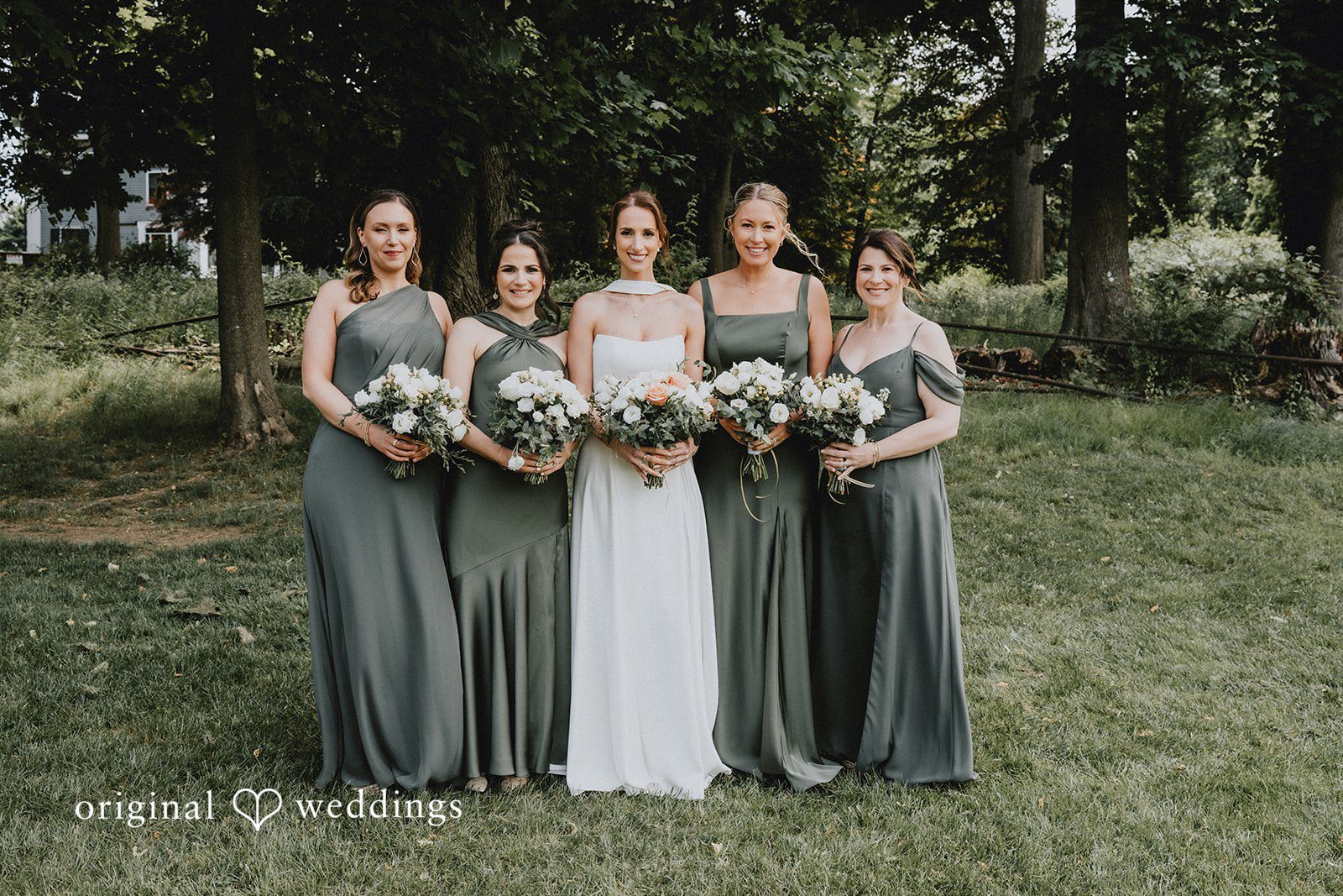 A portrait of the bride and her bridesmaids at the Whitby Castle