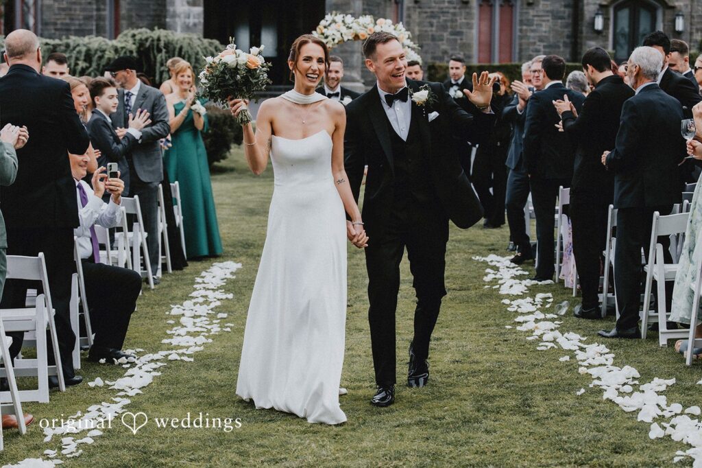 Our New York City wedding photographers captured the moment the couple made a joyful exit after their wedding ceremony