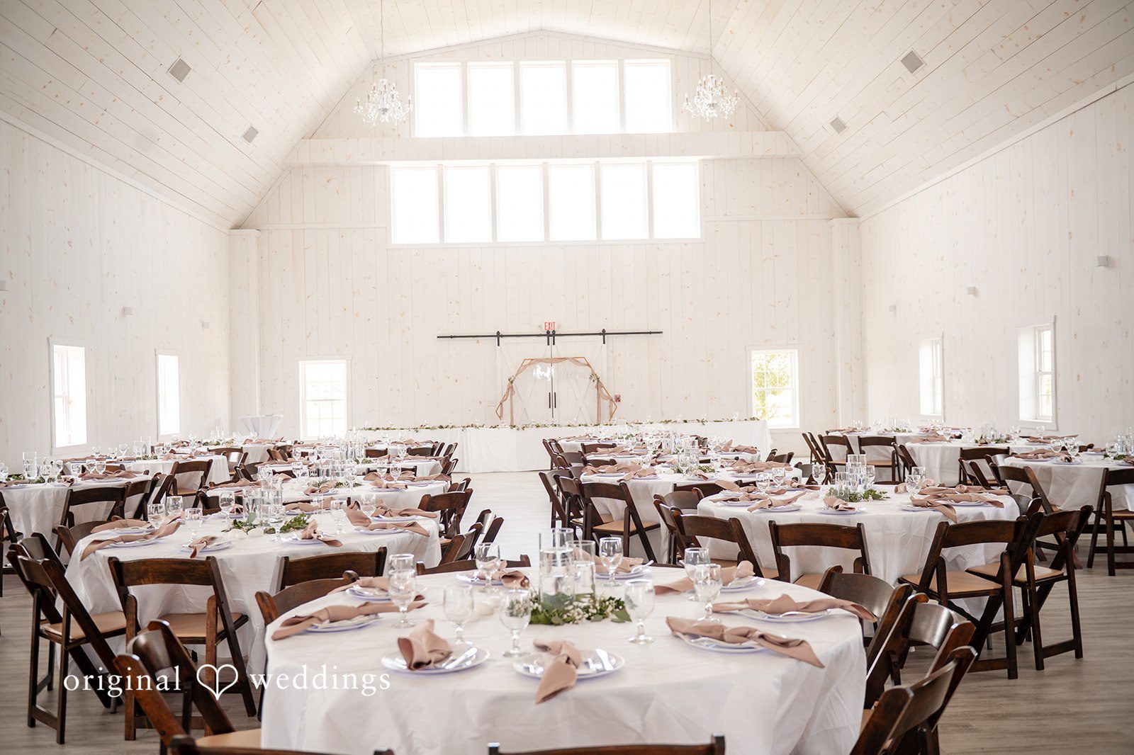 Lauren + Ron Decorated tables at the wedding reception