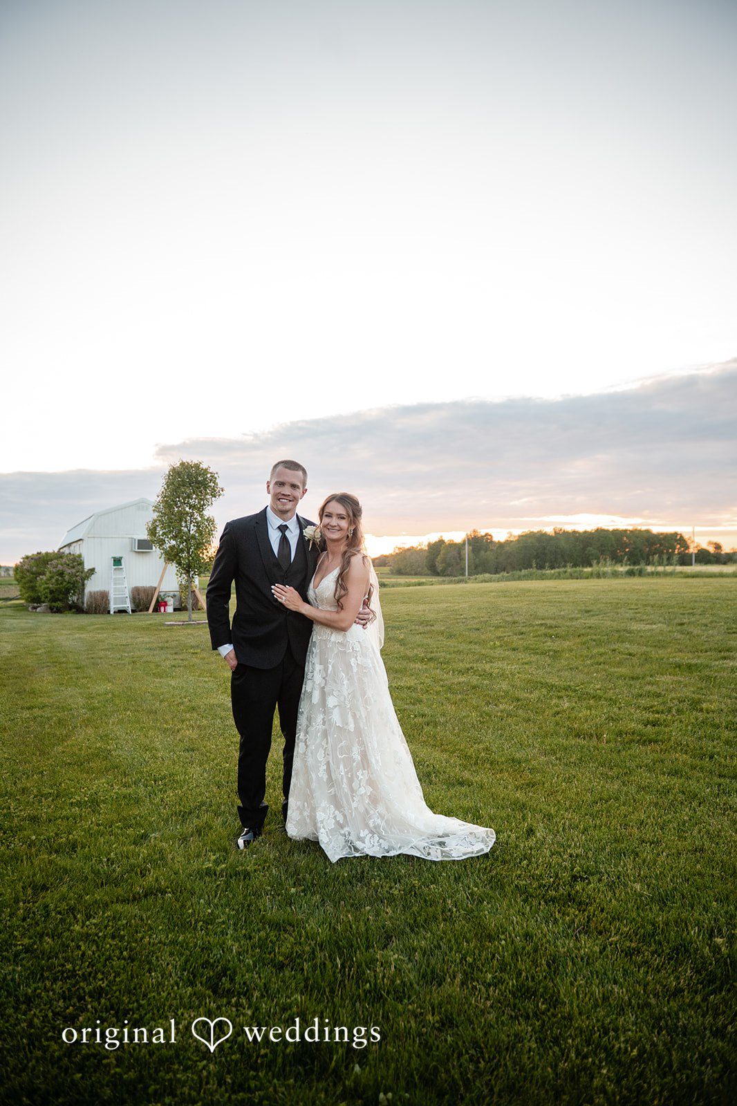 Lauren + Ron A stunning portrait of the couple in the field
