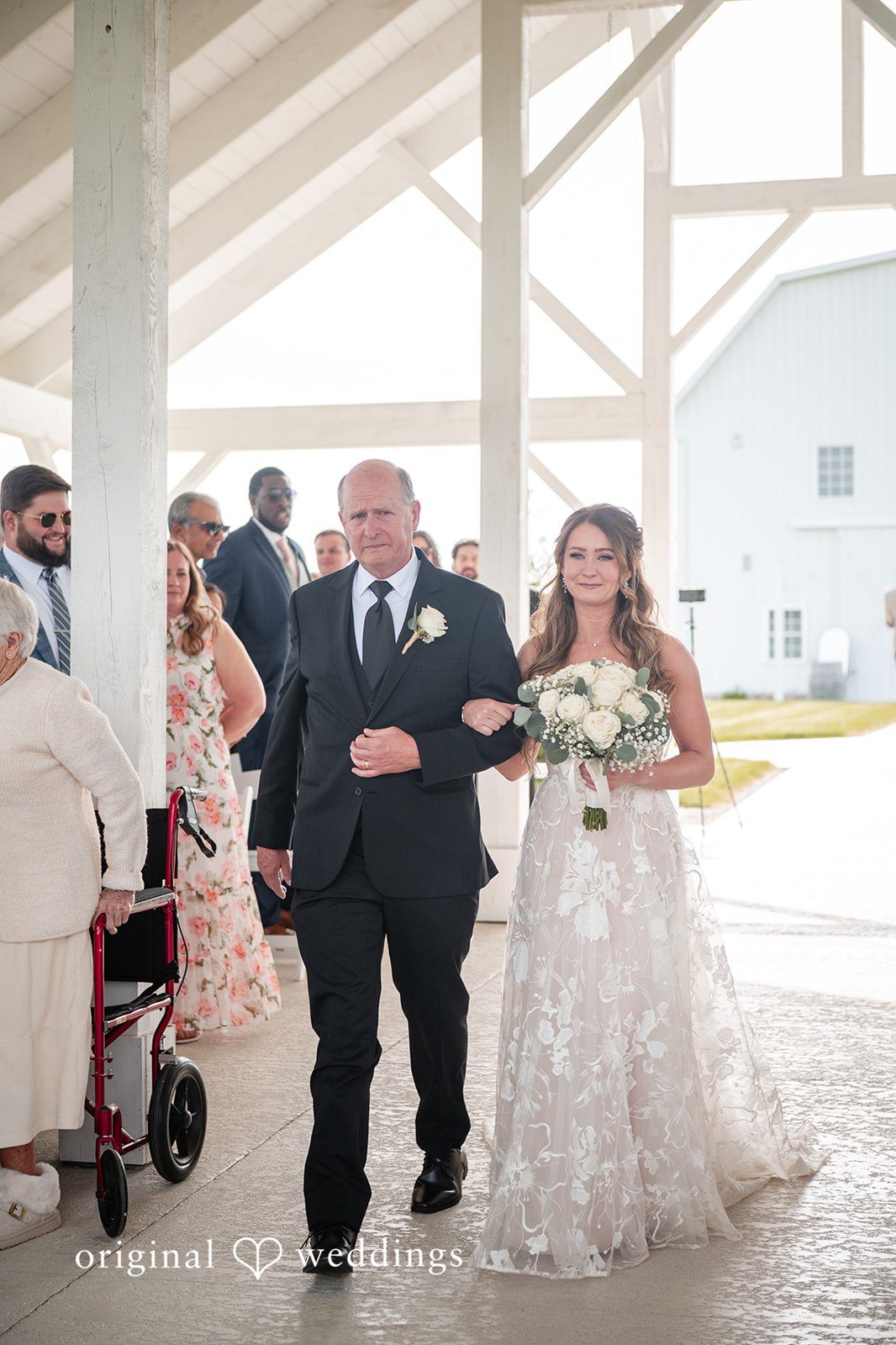 Lauren + Ron The bride's father escorts the bride down the aisle
