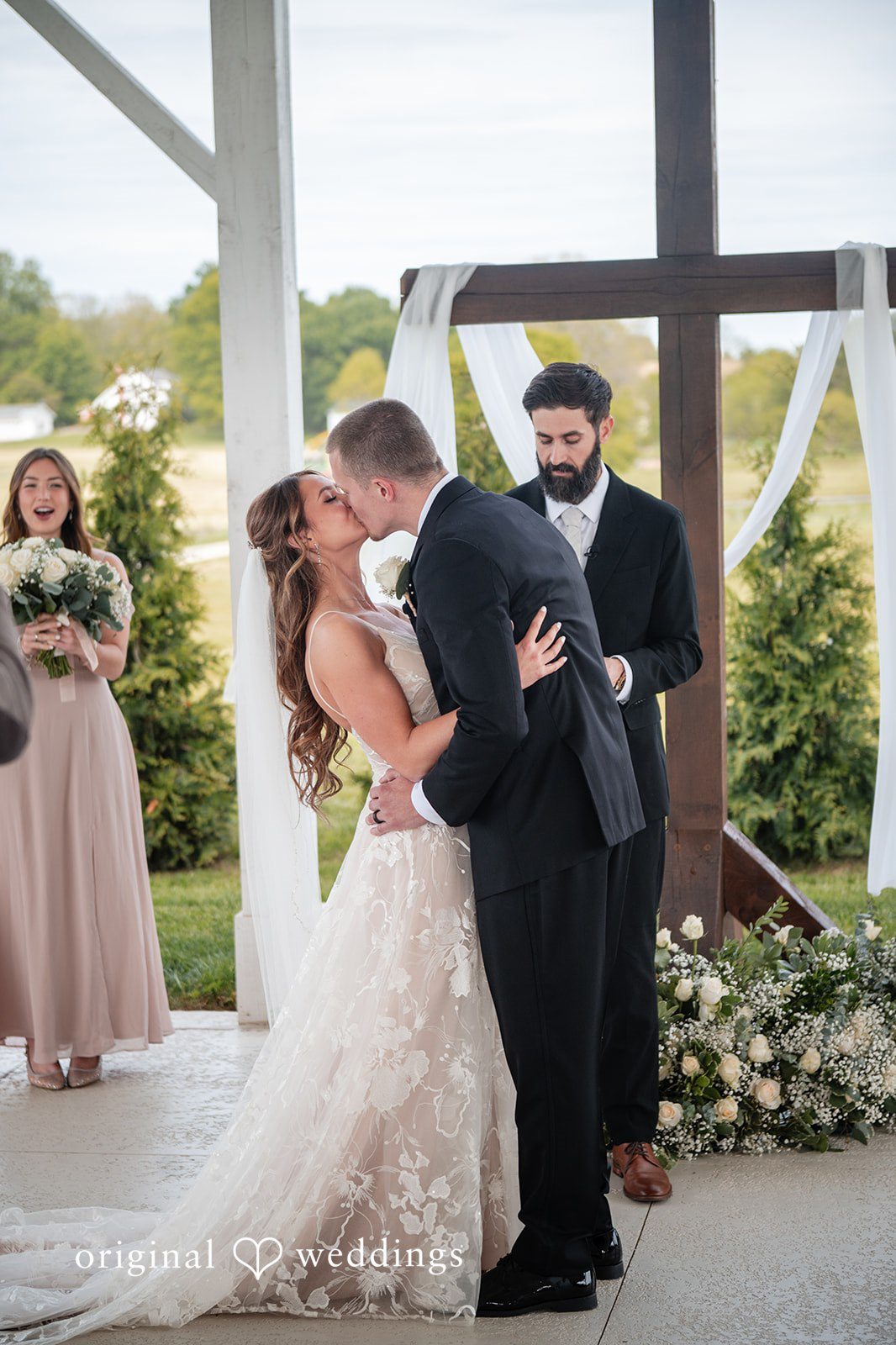 Lauren + Ron The couple takes their first kiss