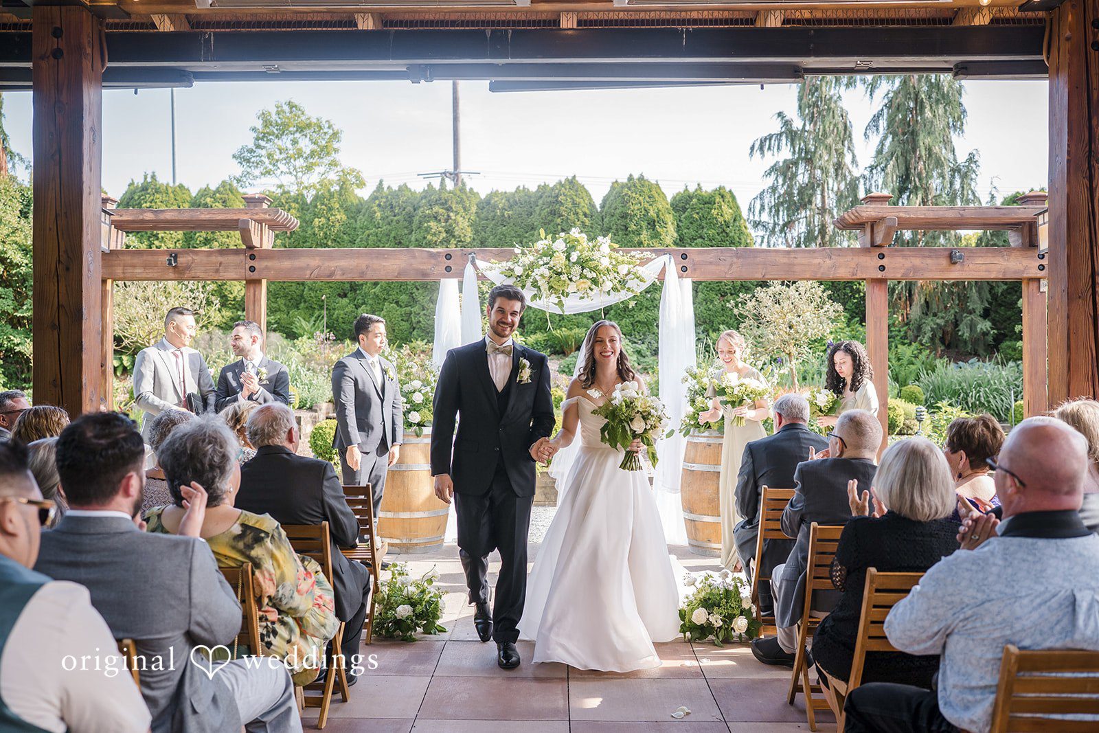 Lovely couple leaving the altar after wedding ceremony