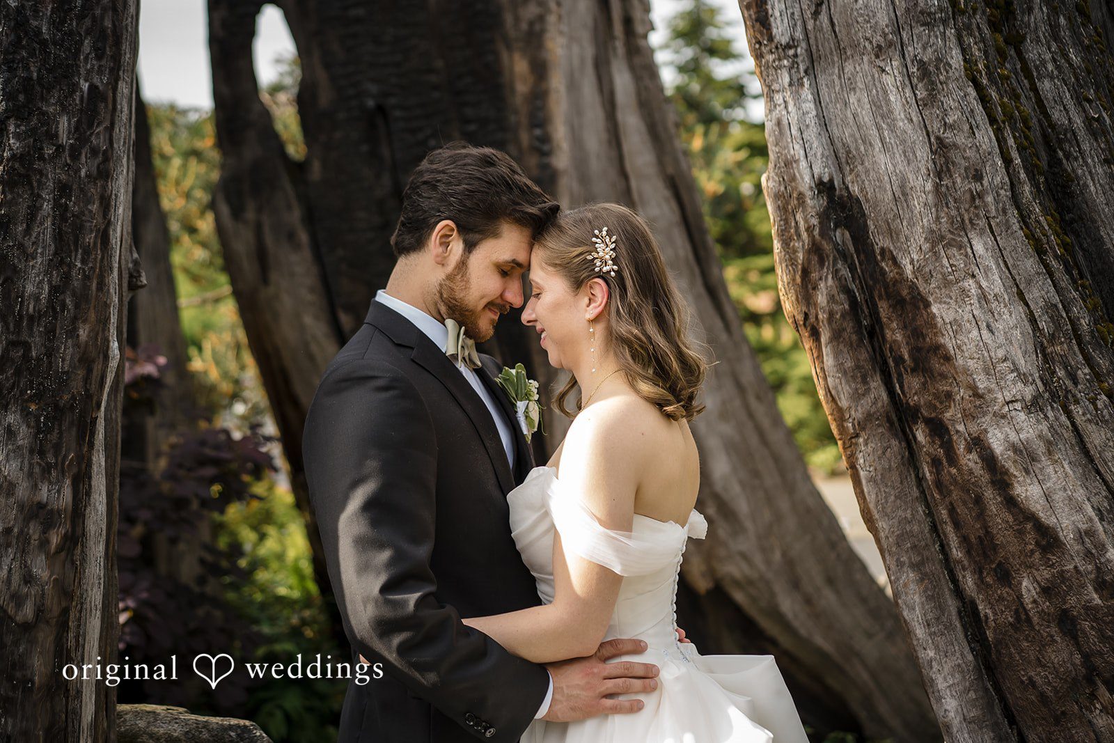 A candid hug moment of couple at Willows Lodge