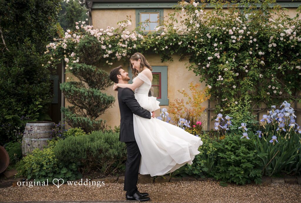 Groom upholding the bride at Willows Lodge captured by Seattle wedding photographers from Original Weddings