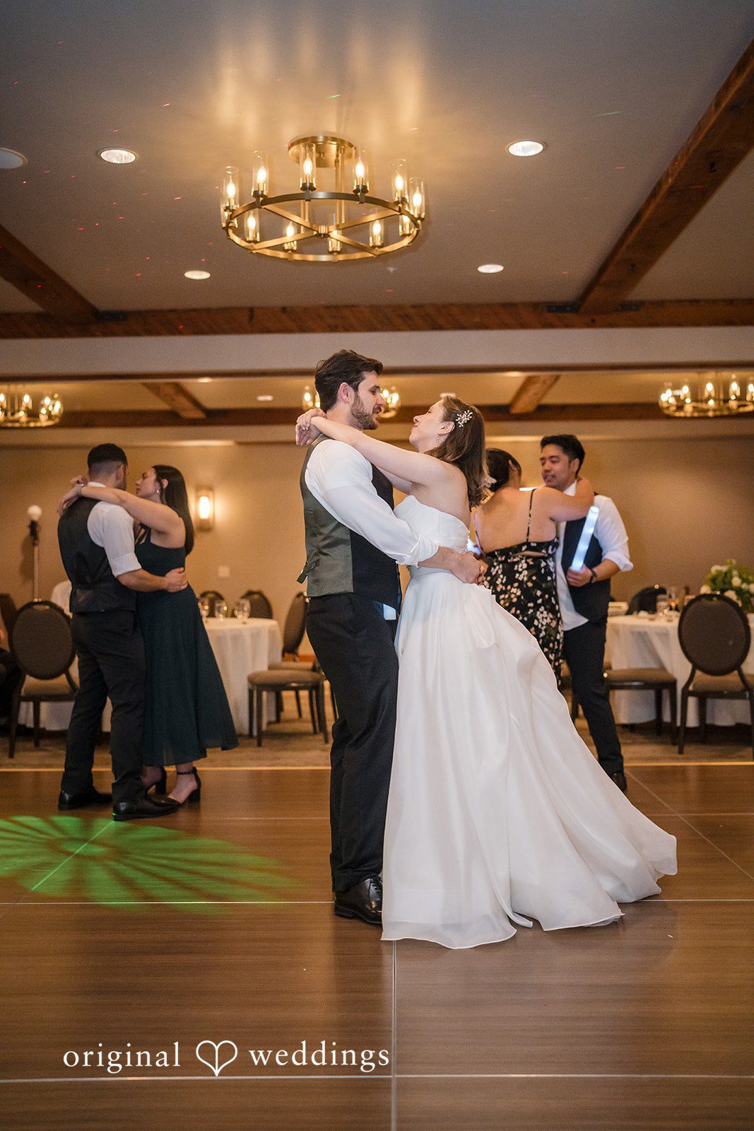 Couple sharing a romantic dance at wedding reception
