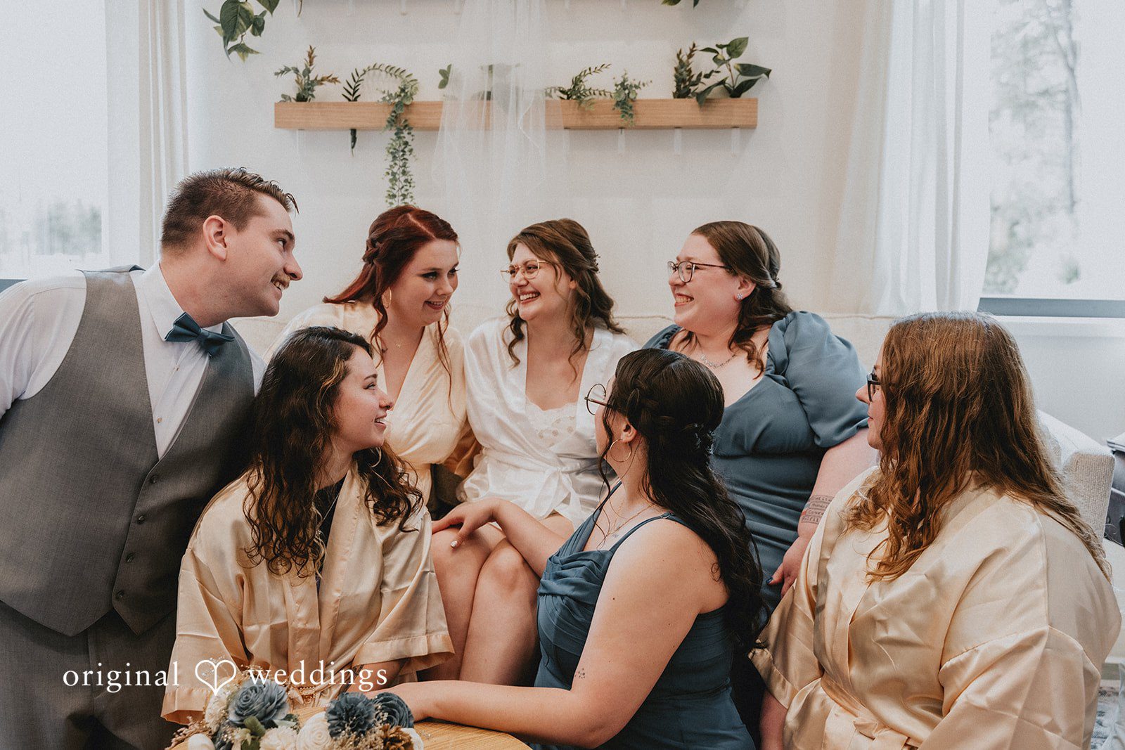 Ashlee + Colby Bride getting ready with her bridesmaids before the wedding ceremony