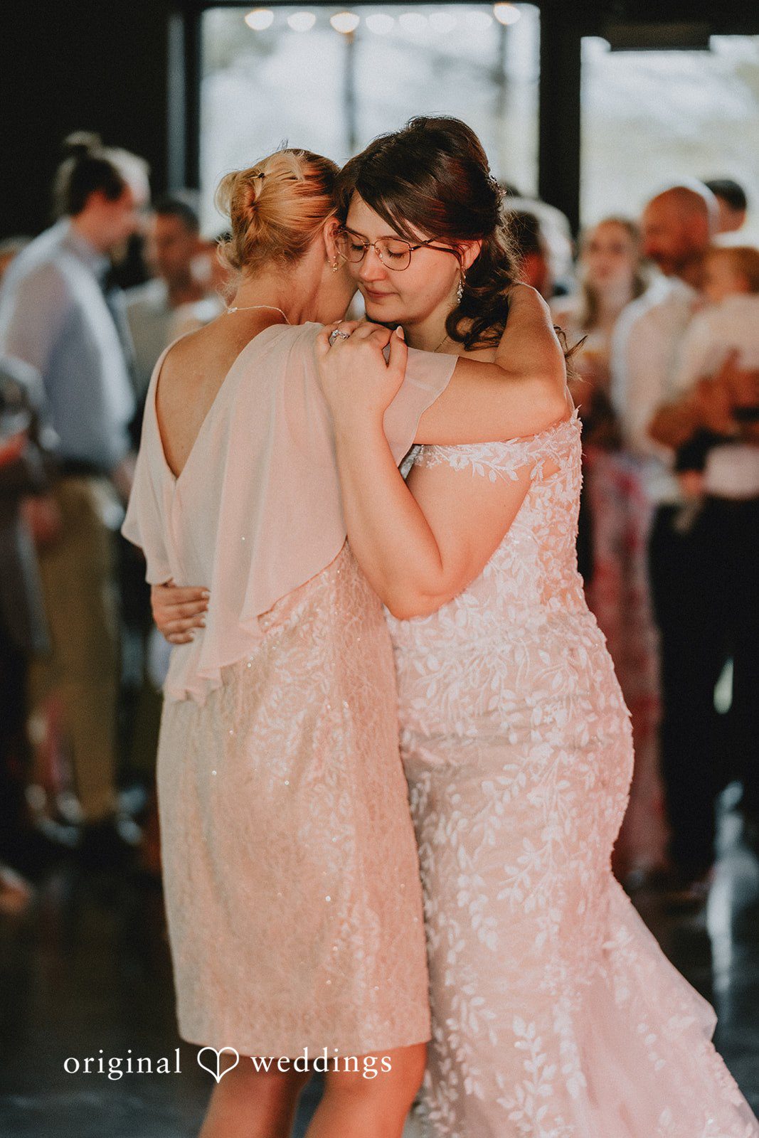 Ashlee + Colby Bride dancing with her mother during an emotional reception moment