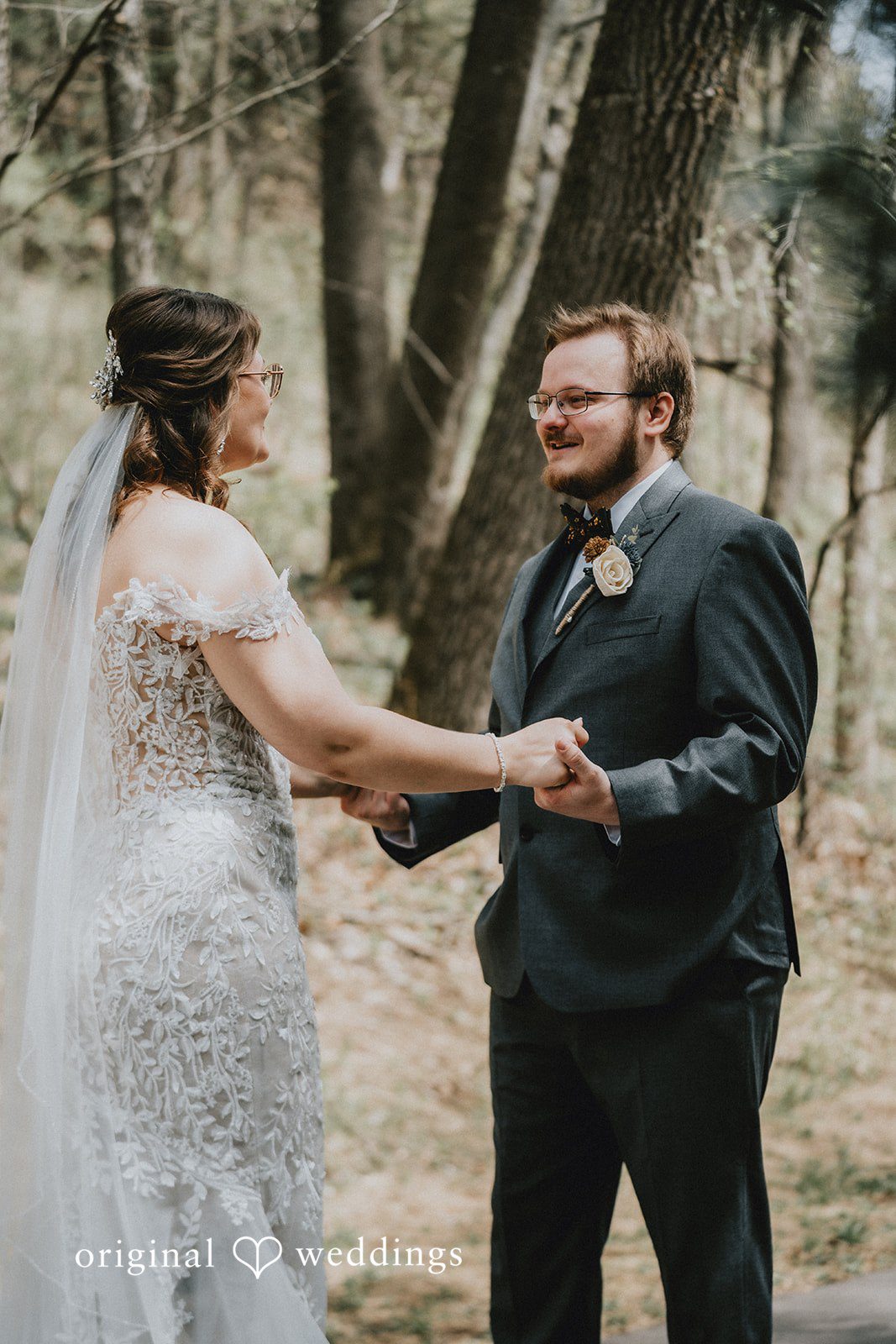 Ashlee + Colby Bride and groom holding hands in an elegant full-length portrait