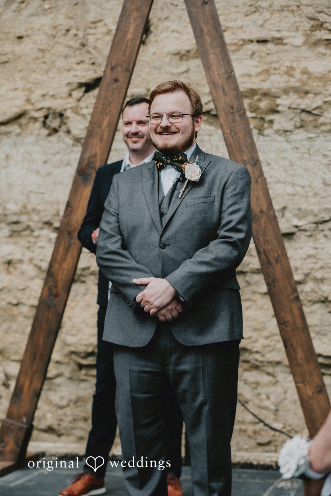 Ashlee + Colby Groom waiting for the bride inside the ceremony space before the celebration
