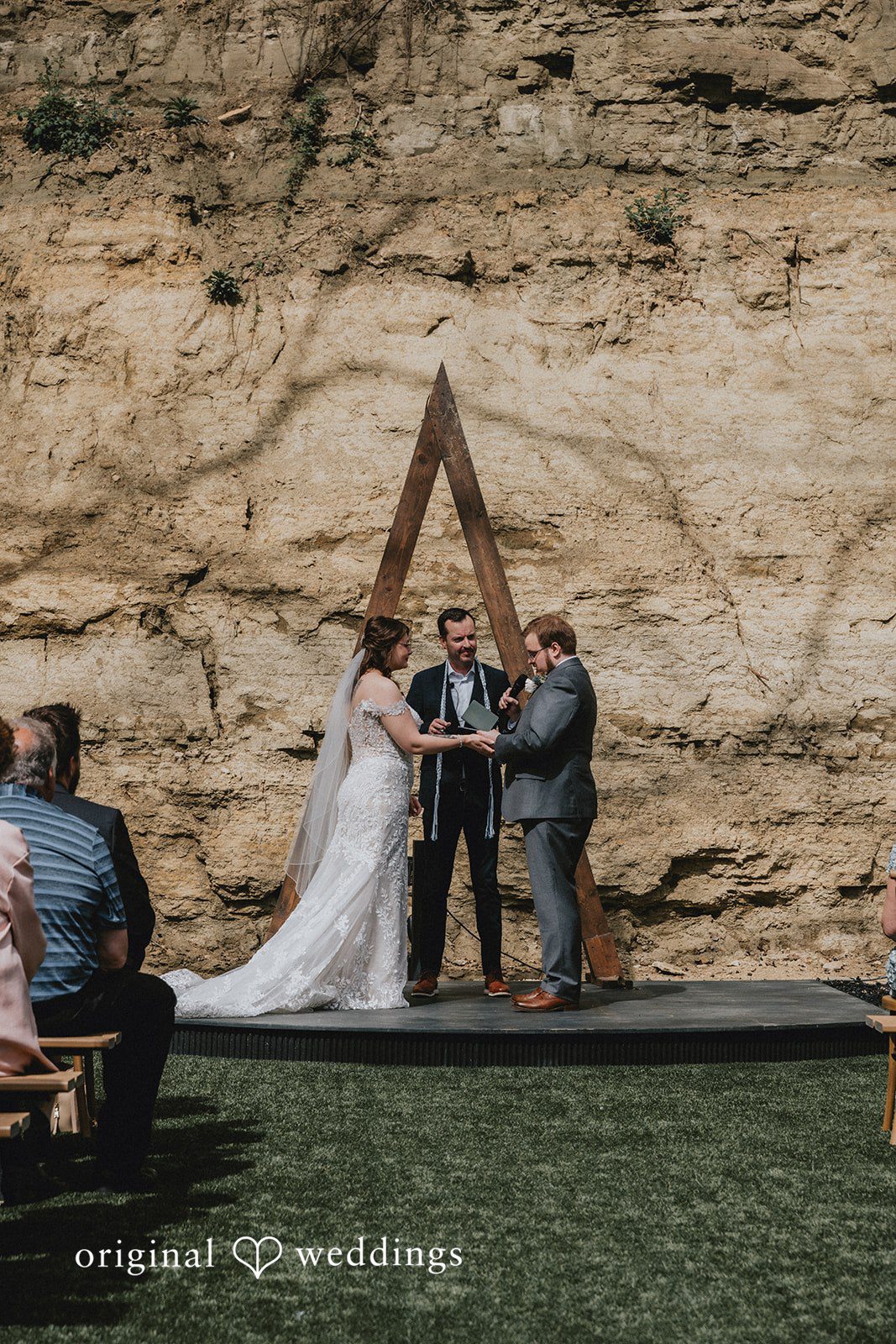 Ashlee + Colby Bride and groom exchanging heartfelt vows during their wedding ceremony
