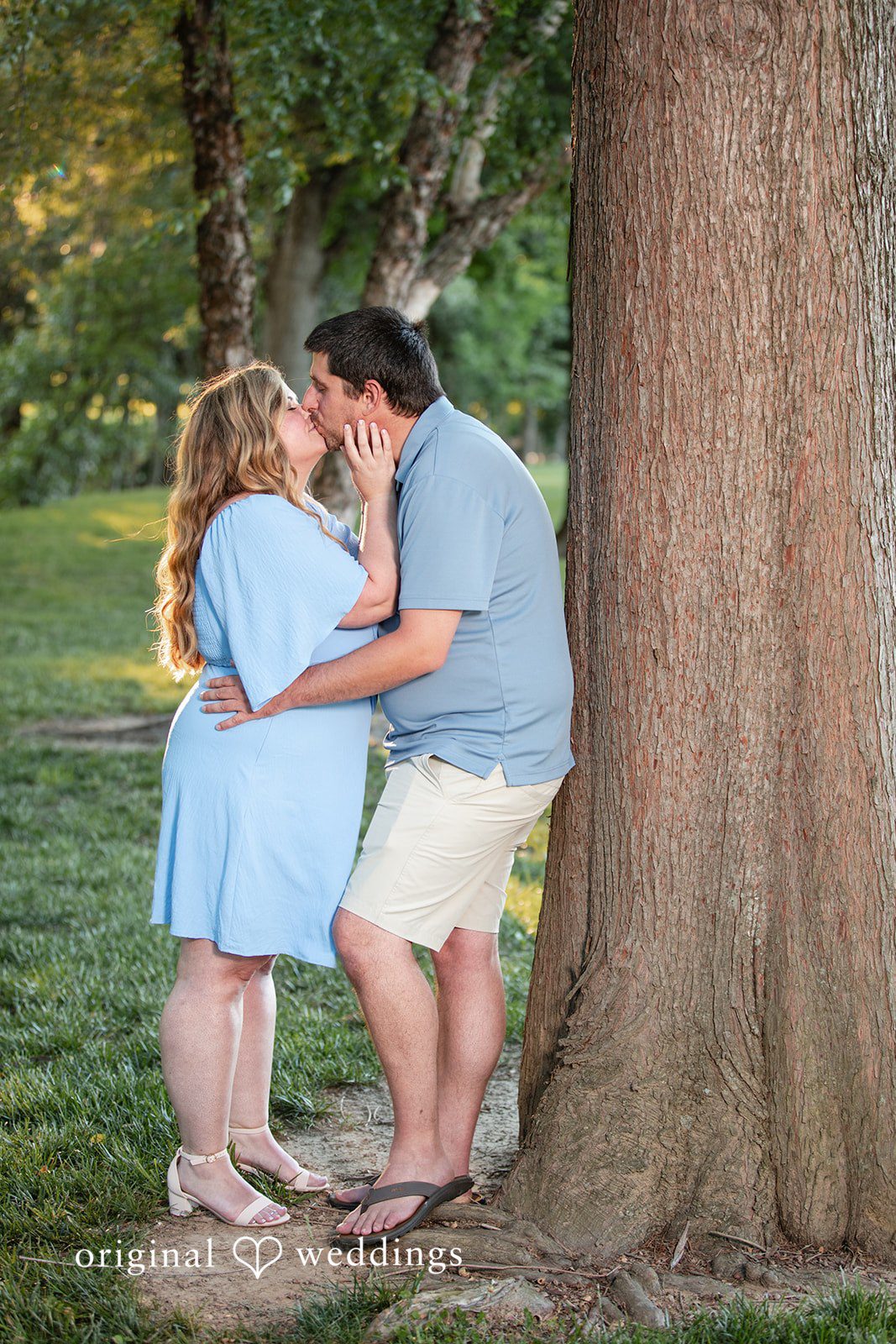 Miranda + Tyler Baltimore Engagement Photographers capturing couple kissing at Baker Park by Original Weddings