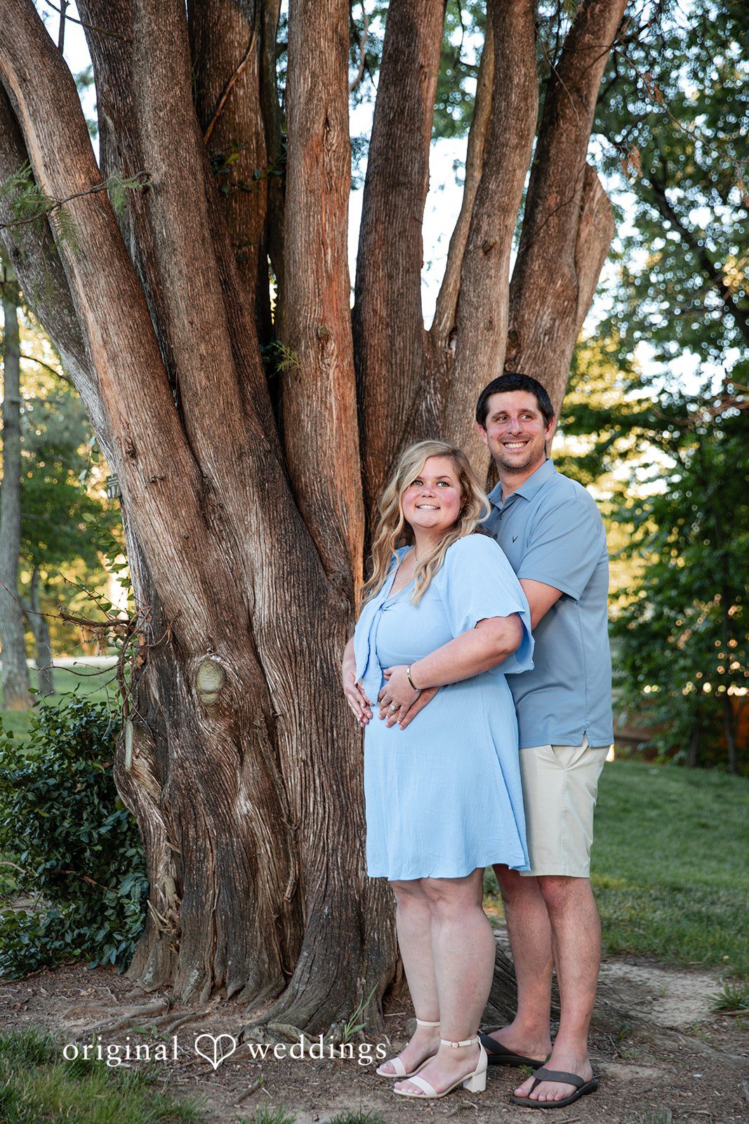 Miranda + Tyler Romantic back hug portrait of the couple at Baker Park