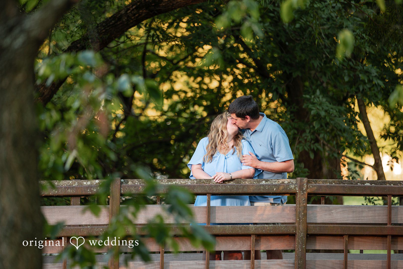 Miranda + Tyler Couple sharing a loving kiss at Baker Park