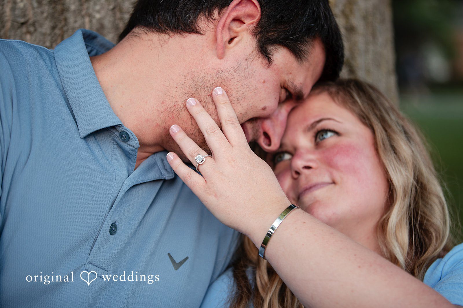 Miranda + Tyler Couple making eye contact during their engagement session at Baker Park