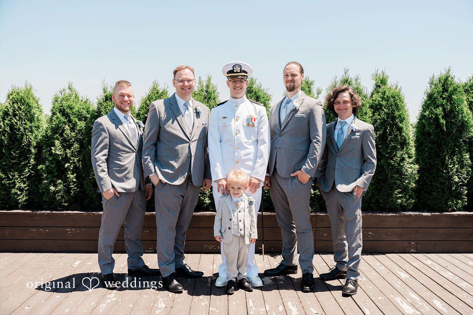 Rachel + Nick Groom smiling with the groomsmen before the ceremony at Batch No. 154