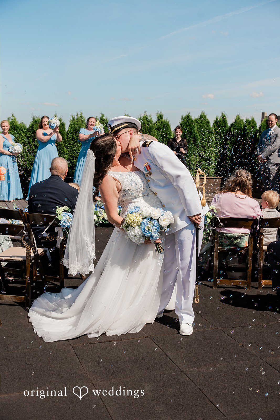 Rachel + Nick Bride and groom kissing during the ceremony at Batch No. 154