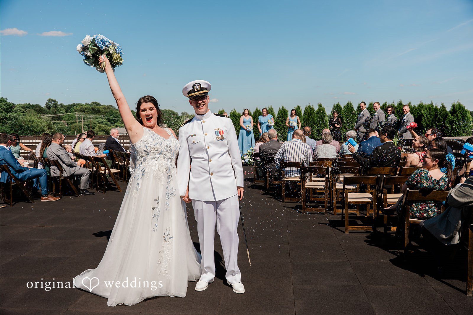 Rachel + Nick Detroit Wedding Photographers capturing couple standing together while smiling at Batch No. 154 by Original Weddings