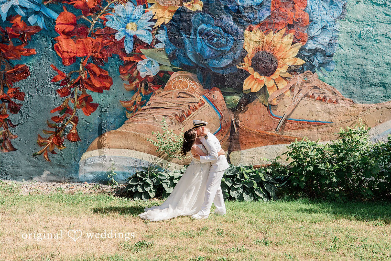 Rachel + Nick Couple kissing with a beautiful scenic background at Batch No. 154
