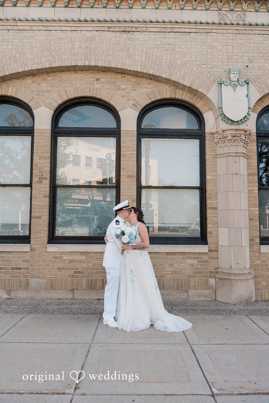 Rachel + Nick Bride and groom kissing during their portrait session at Batch No. 154