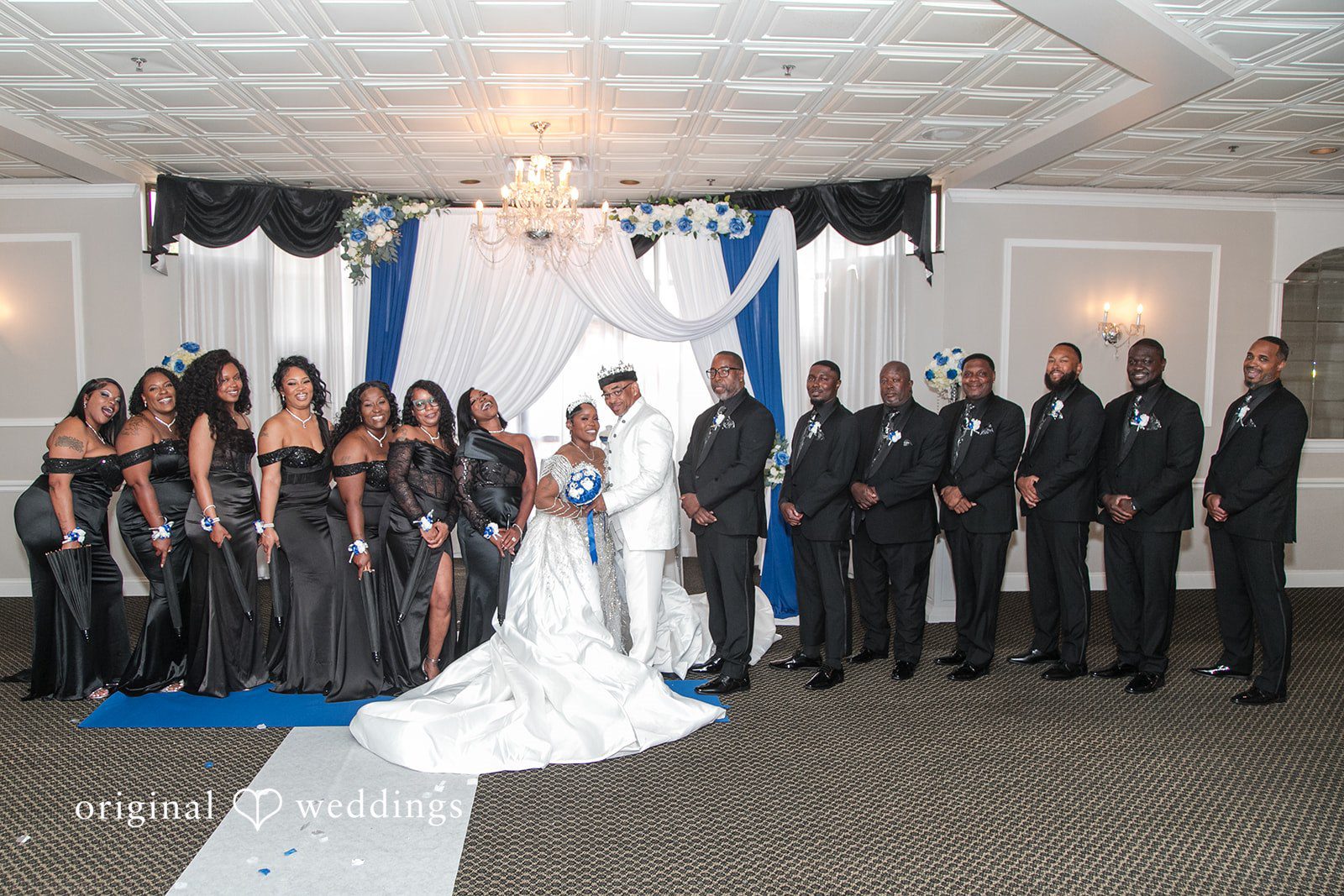 Glen + Constance A stunning portrait of the couple and their bridal party at the Belle Salle Banquets