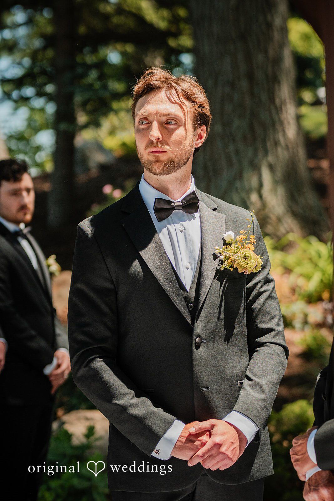 Trey + Bailey Groom waiting for the bride during the ceremony at Blake's Backyard