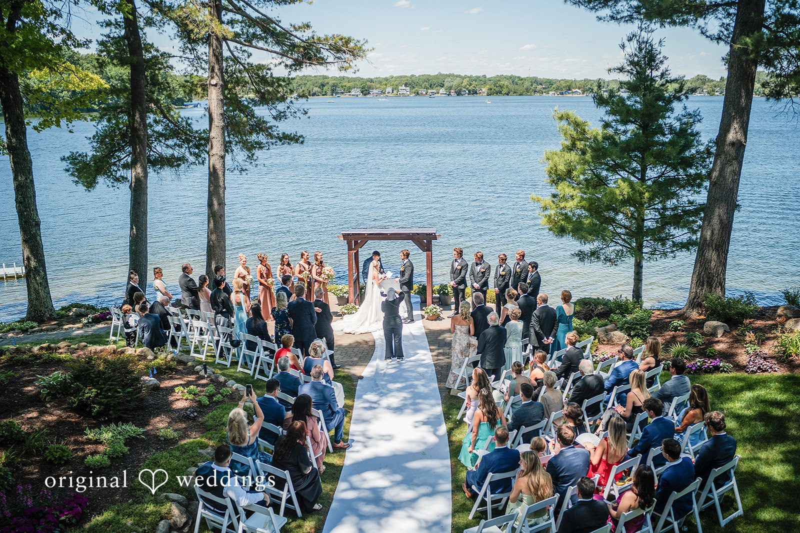 Trey + Bailey Beautiful overhead view of a waterfront wedding celebration