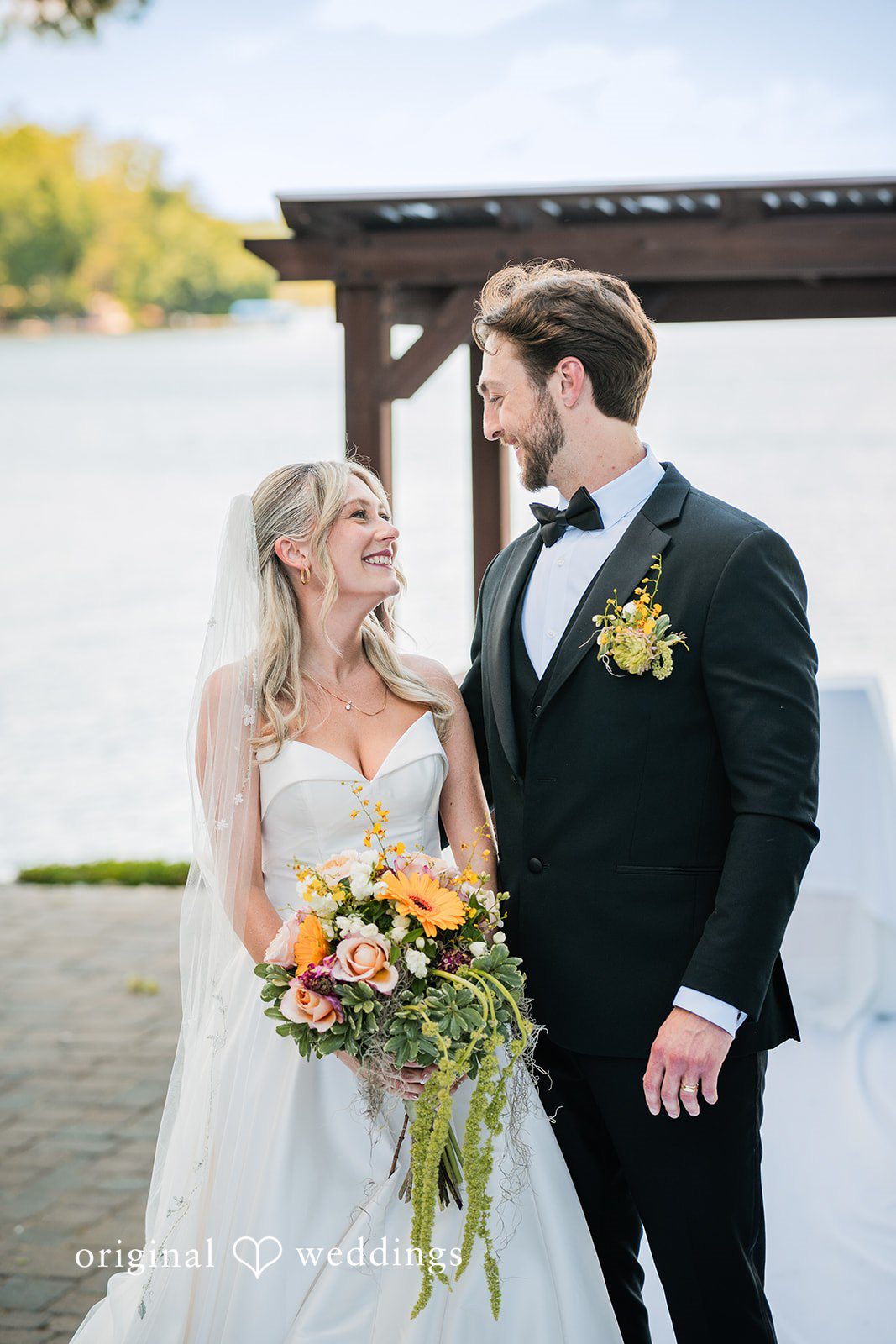 Trey + Bailey Romantic wedding portrait beside the waterfront