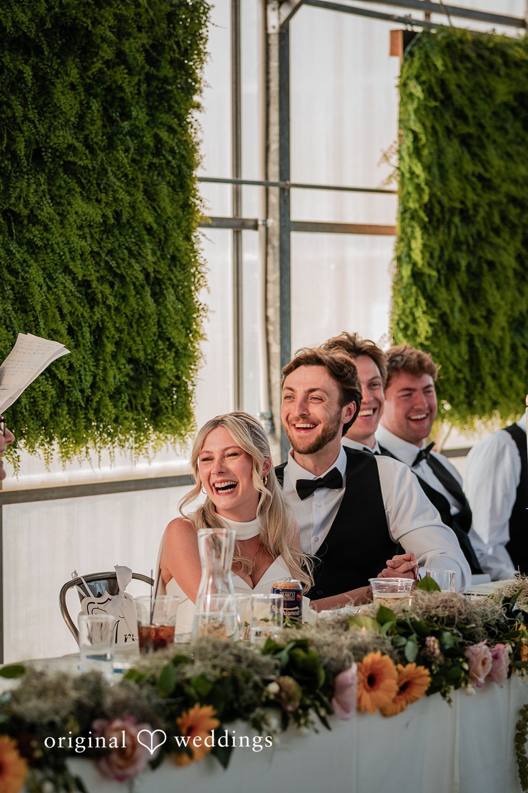 Trey + Bailey Happy newlyweds enjoying reception speeches surrounded by family and friends.