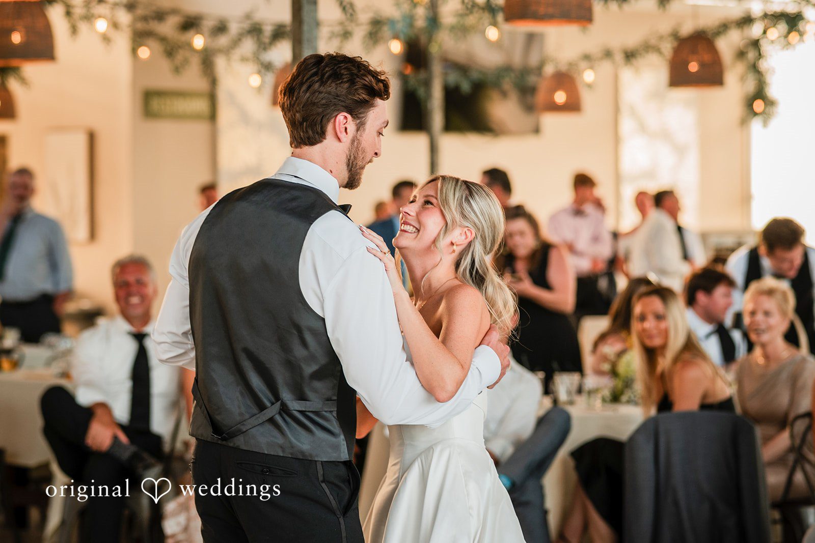 Trey + Bailey Bride and groom sharing their first dance at Blake’s Backyard captured by Detroit Wedding Photographers from Original Weddings.