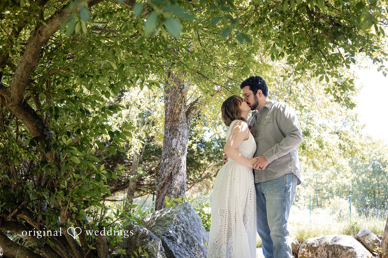Couple sharing a kiss during their engagement session at Borderland State Park