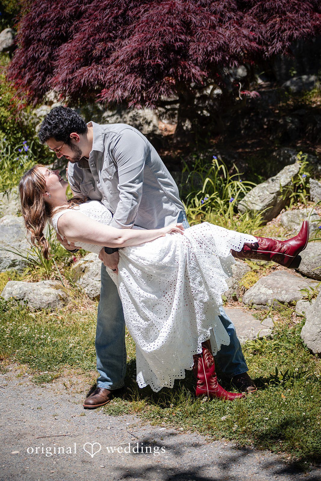 Groom lifting his fiancée during the engagement session at Borderland State Park