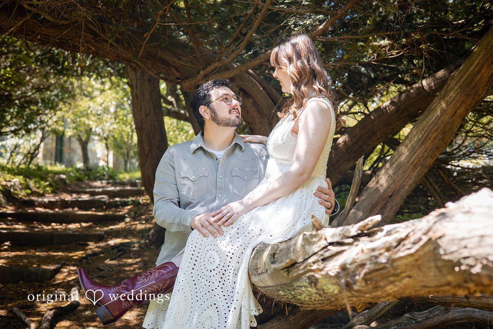 Bride seated while sharing eye contact with the groom at Borderland State Park
