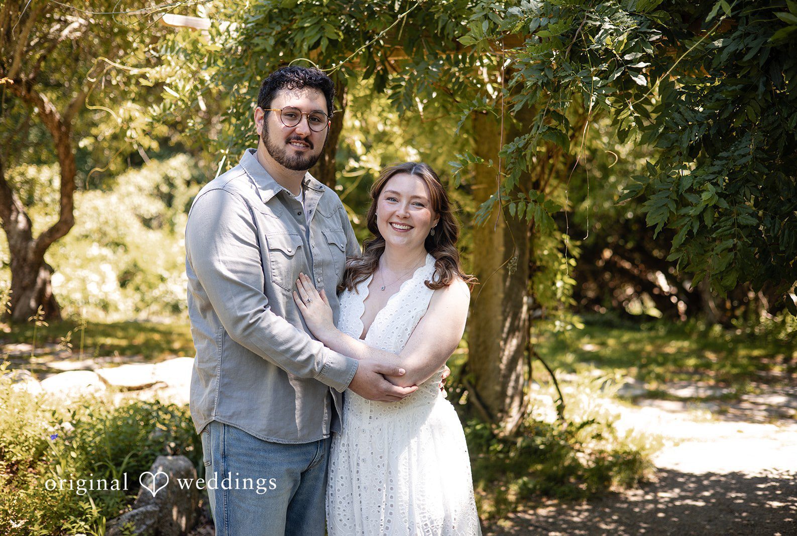 Engagement Photography Services by Original Weddings capturing couple smiling at the camera at Borderland State Park